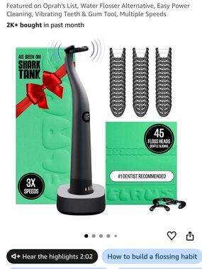 Flaus electric flosser, comes with pack of replacement heads, charger and stand